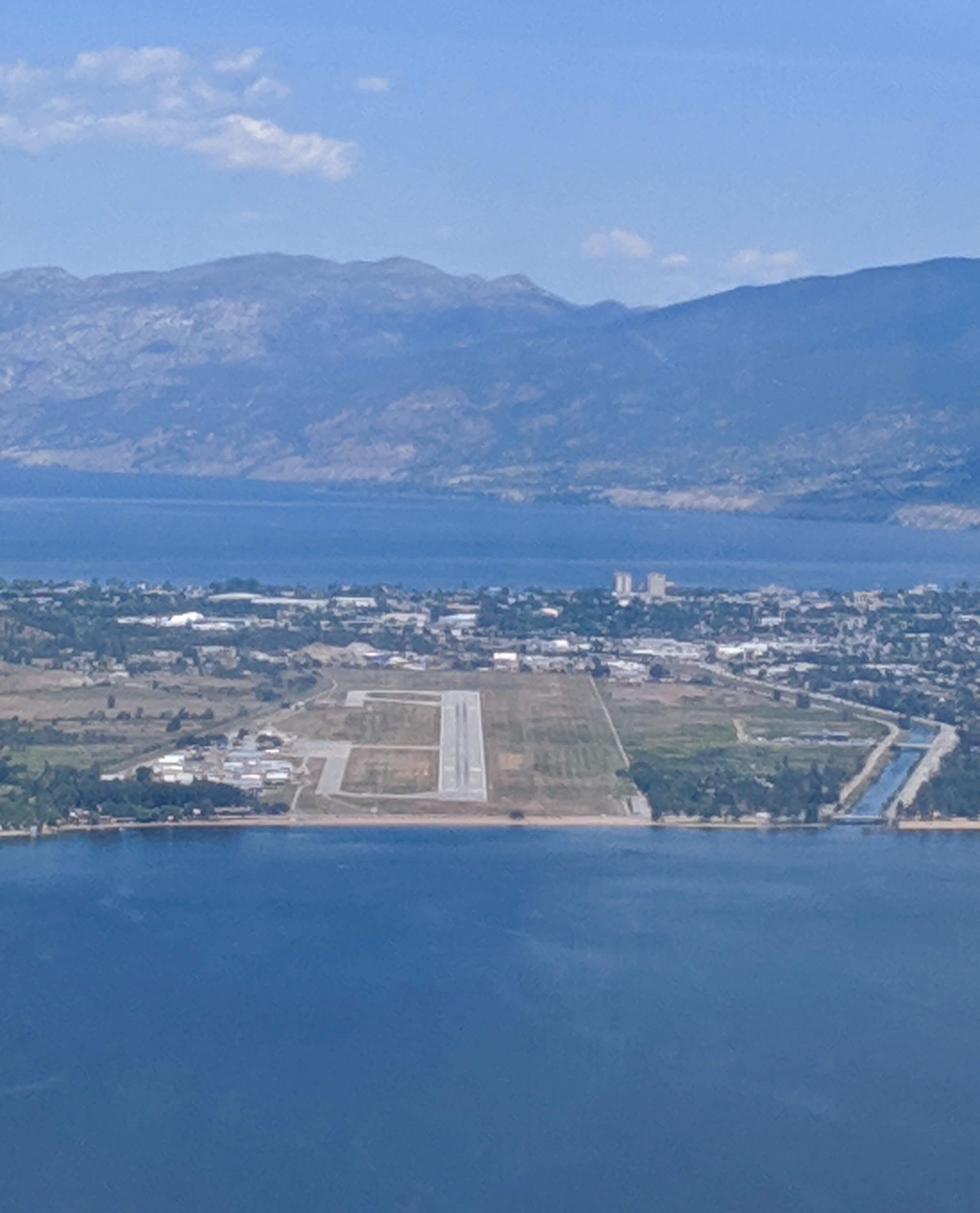 An aerial photograph of an airport runway