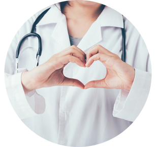 Doctor holds hands in a heart shape.