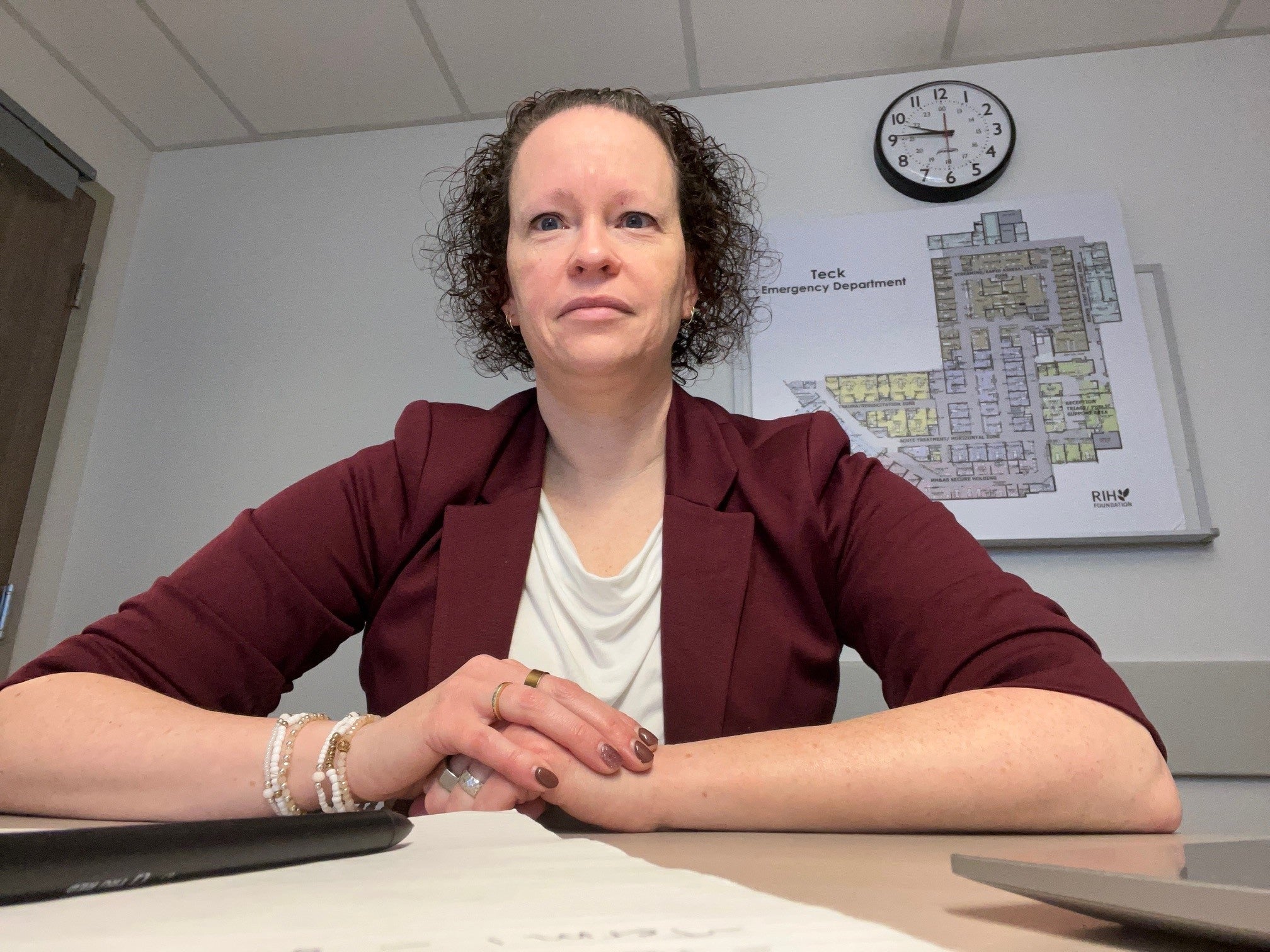 A health-care worker smiles in an X-Ray room at Royal Inland Hospital.