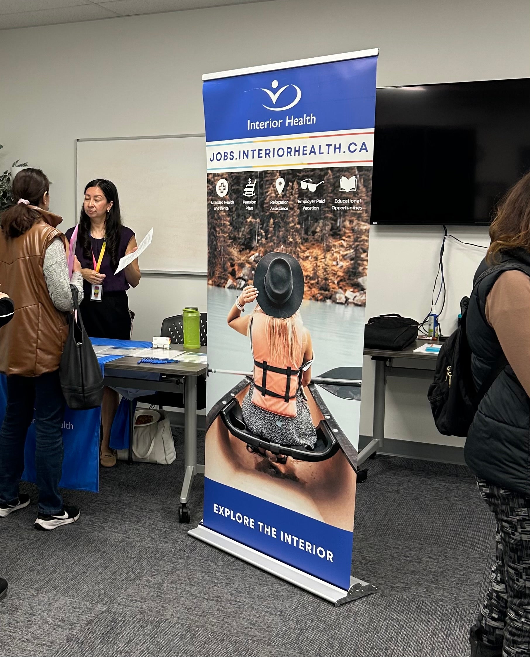 a banner at a trade show for recruitment