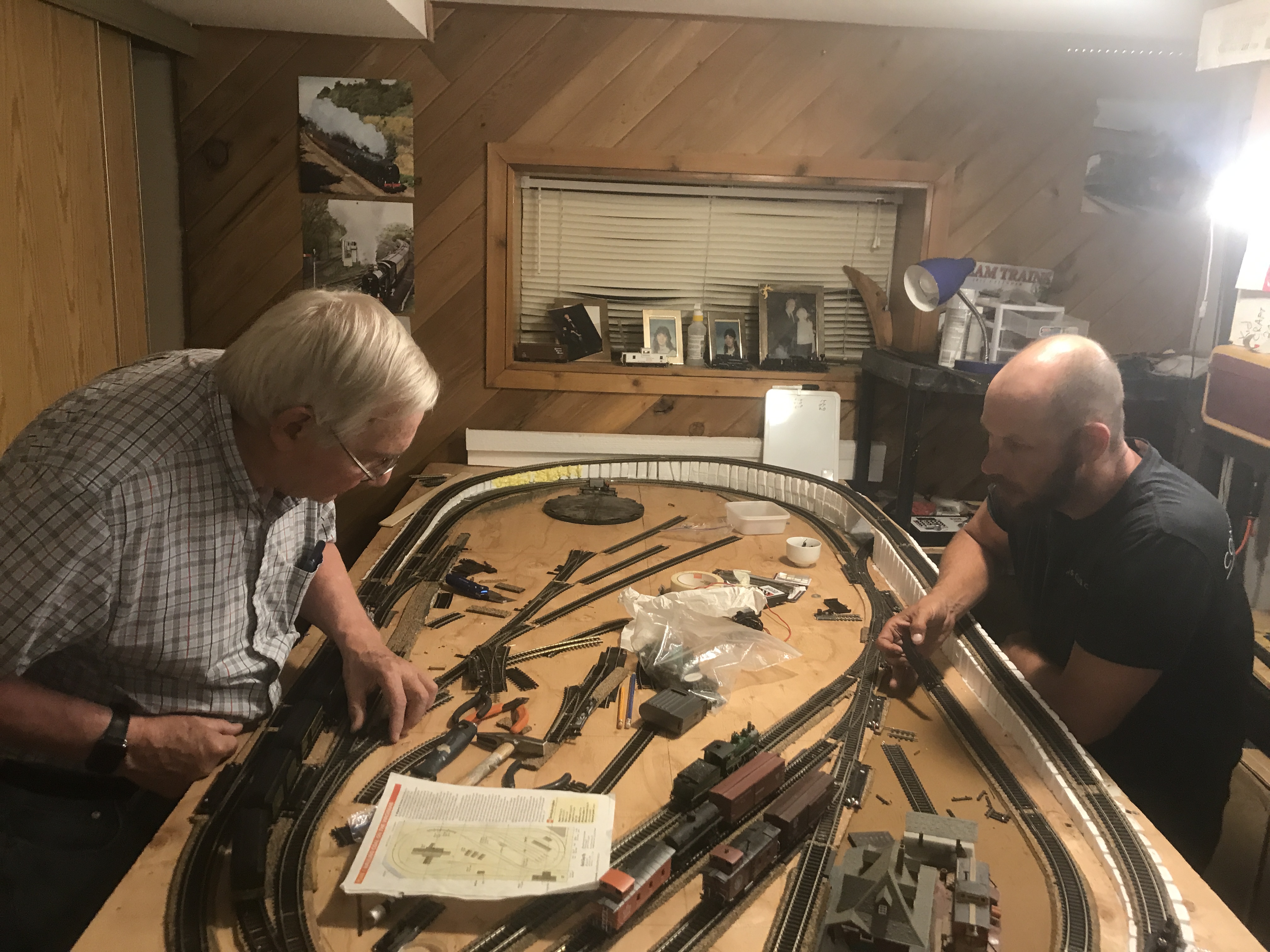Peter and his son in law James doing model railroading.