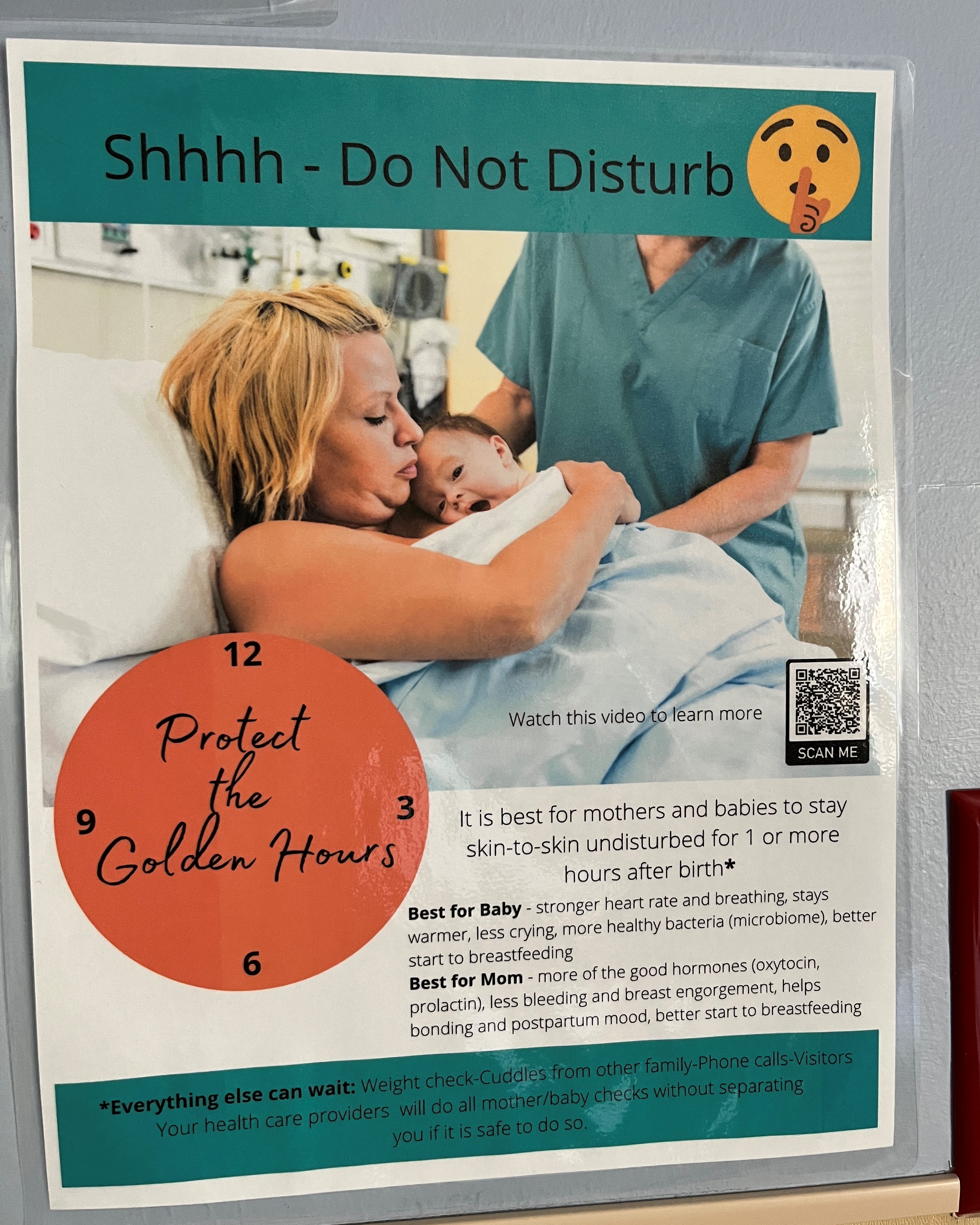 A poster on a wall that promotes undisturbed skin-to-skin contact for new mothers that says Shhhh – Do Not Disturb, protect the golden hours
