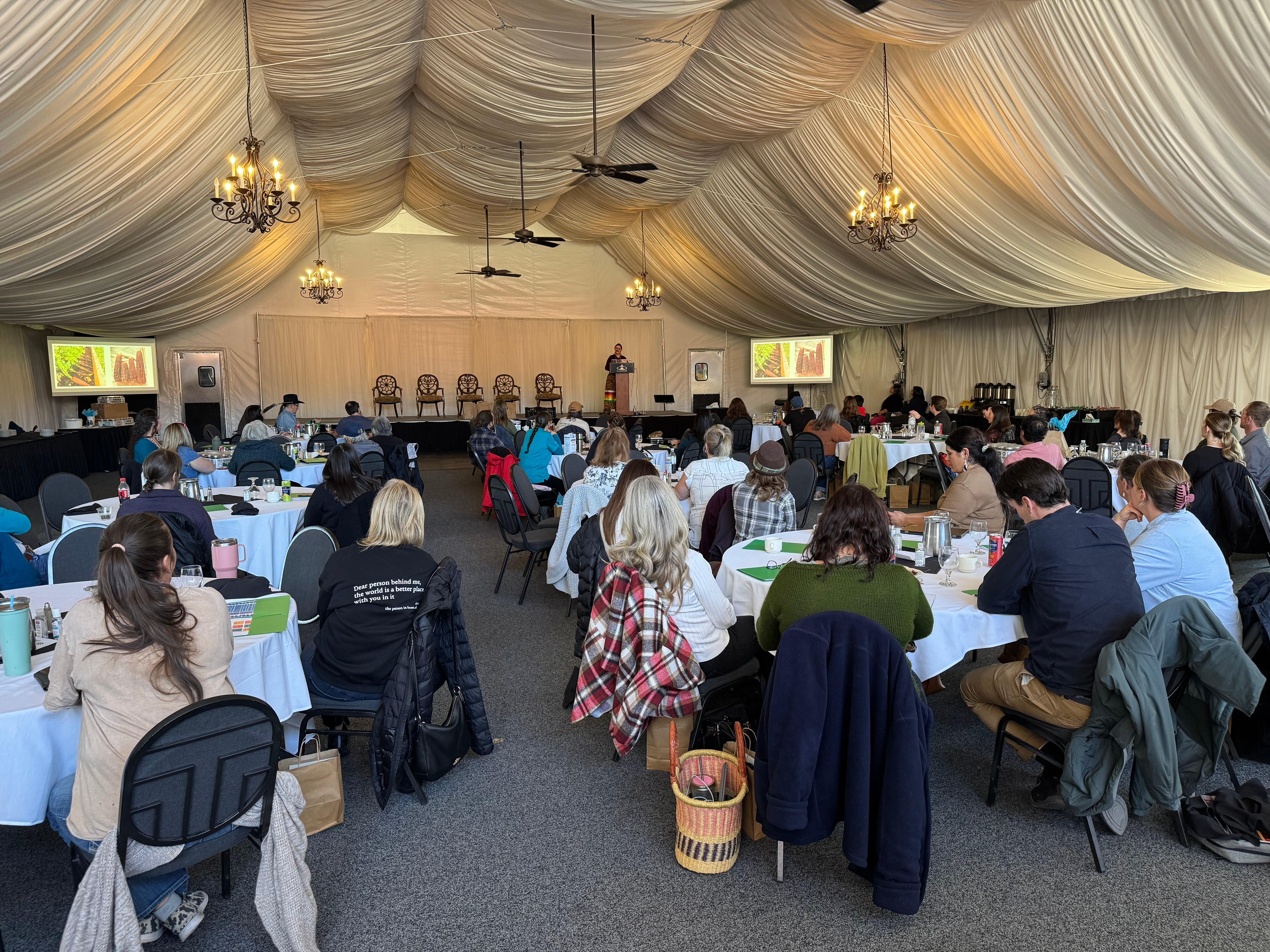 forum food tent with people sitting in it