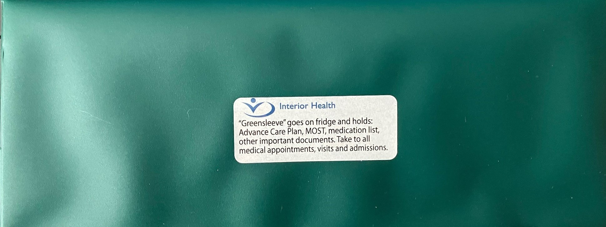Image of a Greensleeve, a green, plastic folder, for advanced care planning. 