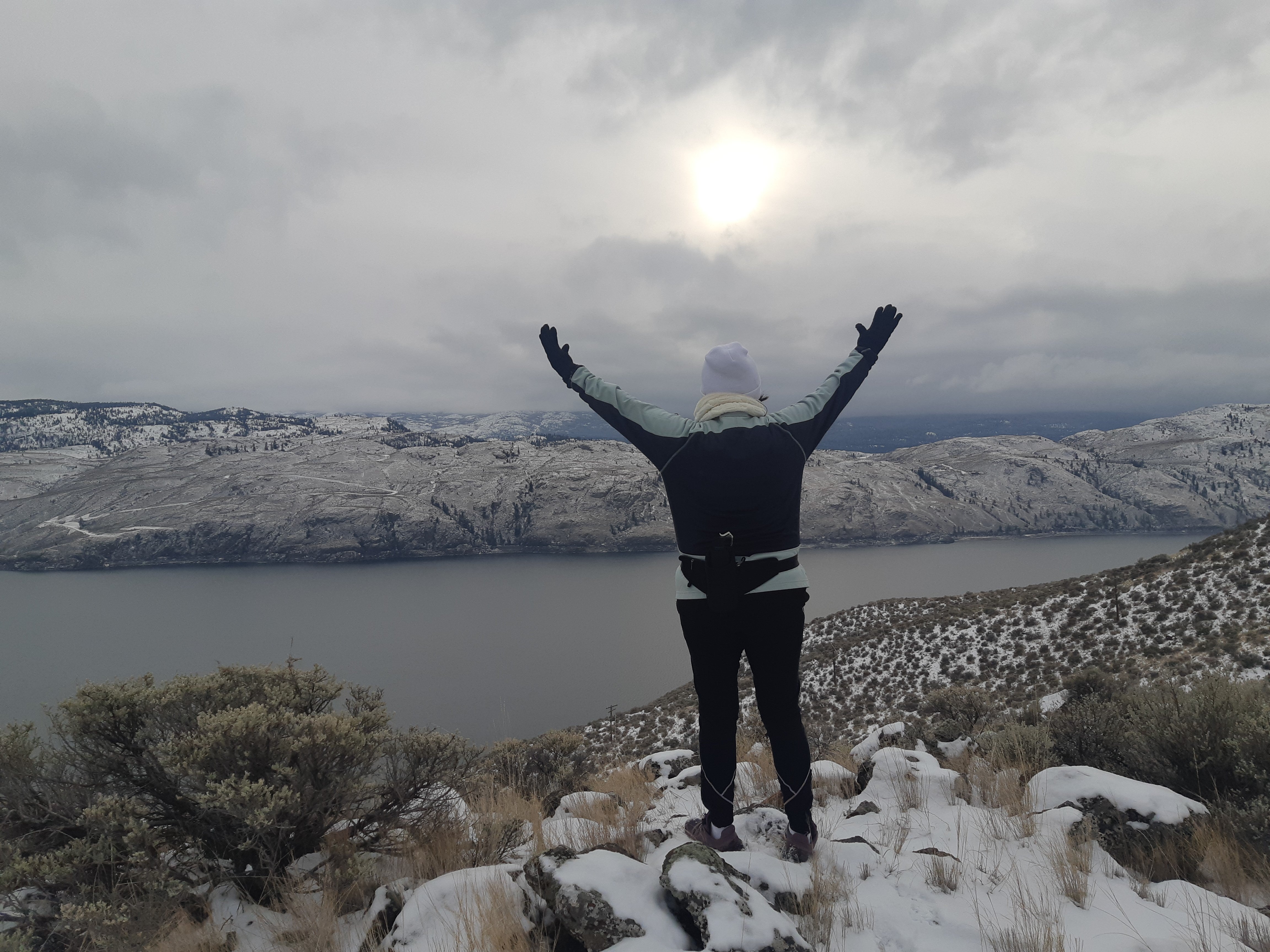 Jacqueline enjoys the view on a hike.