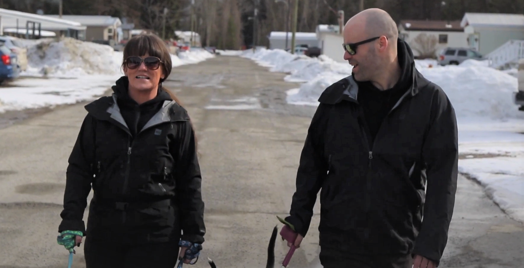 Patrick and Jessica walking down the street