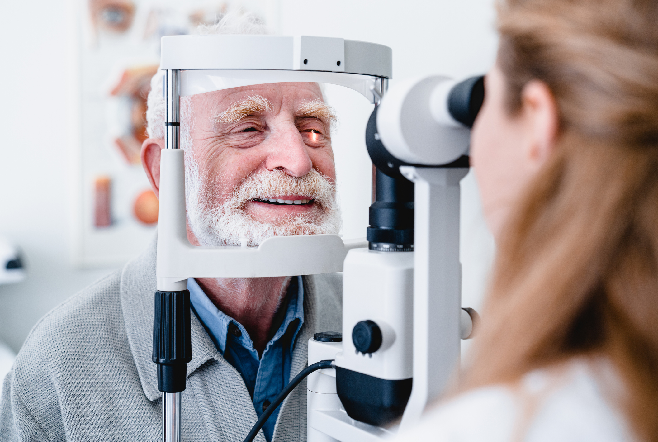 A senior having his eyes checked.