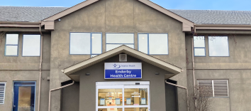 the outside of a medical building on a blue sky day