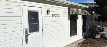 a white building in the summer