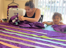 Sewing the symbolic ribbon skirts for Indigenous volunteers at this years International Overdose Awareness Day events in Kelowna.