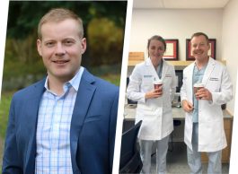 a female and male doctor wearing their lab coats enjoy a coffee